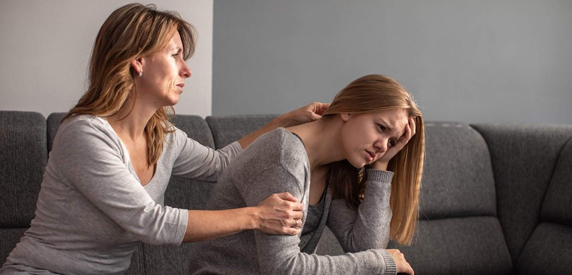 therapist comforting woman