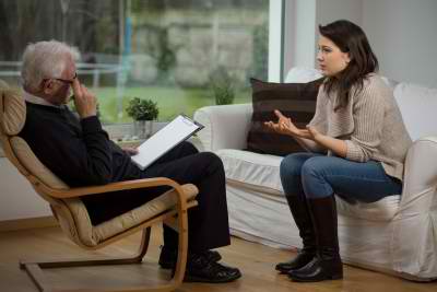 a patient talking to a psychologist