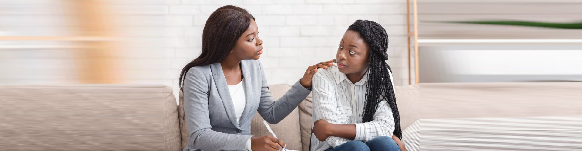 therapist comforting woman