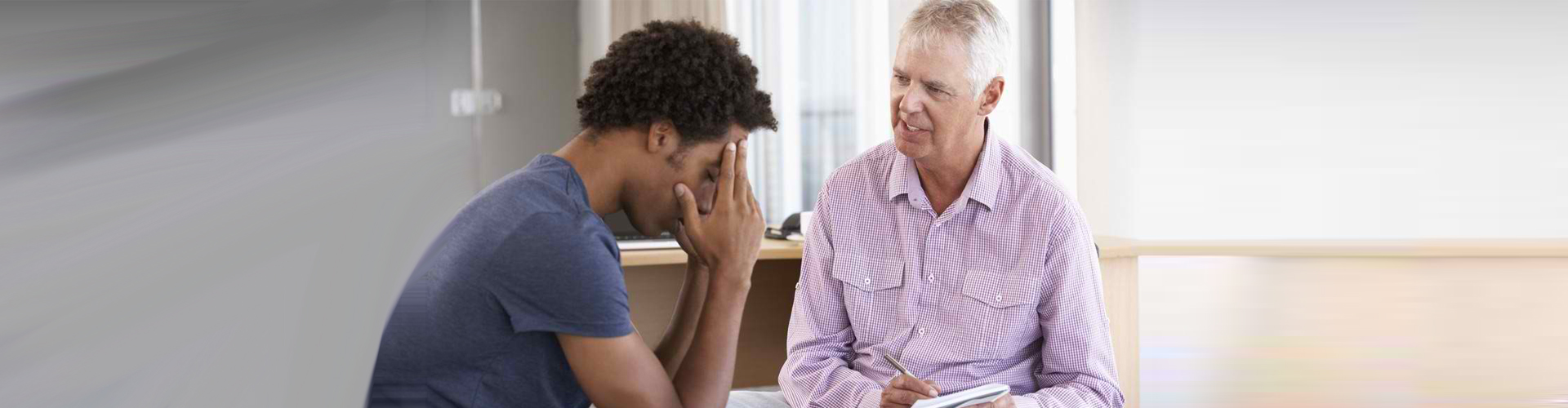 a man talking a psychologist